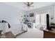 Bedroom with double bed, vanity, and sunflower wall art at 1102 E Bartlett Way, Chandler, AZ 85249