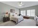 Spacious bedroom with a king-size bed and window at 1102 E Bartlett Way, Chandler, AZ 85249