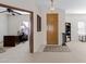 Bright entryway with wood floors and home office at 1102 E Bartlett Way, Chandler, AZ 85249