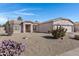 Single-story home with desert landscaping and two-car garage at 1102 E Bartlett Way, Chandler, AZ 85249