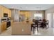 Kitchen boasts ample cabinetry, stainless steel appliances, and an island at 1102 E Bartlett Way, Chandler, AZ 85249