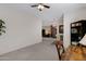 Home office with desk, chair, and built-in shelves at 1102 E Bartlett Way, Chandler, AZ 85249