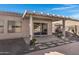Covered patio with built-in grill and stone pathway at 1102 E Bartlett Way, Chandler, AZ 85249