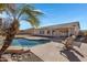Relaxing backyard oasis with a sparkling pool and patio at 1102 E Bartlett Way, Chandler, AZ 85249