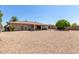 Spacious backyard with gravel and covered patio at 11030 W Pleasant Valley W Rd, Sun City, AZ 85351
