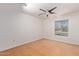 Bedroom with ceiling fan and track lighting at 11030 W Pleasant Valley W Rd, Sun City, AZ 85351