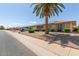 Ranch-style home with solar panels and landscaped yard at 11030 W Pleasant Valley W Rd, Sun City, AZ 85351