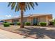 Ranch-style home with solar panels and landscaped yard at 11030 W Pleasant Valley W Rd, Sun City, AZ 85351