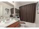 Clean bathroom with shower/tub combo and updated vanity at 1350 W Seascape Dr, Gilbert, AZ 85233