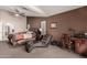 Primary bedroom with sitting area and ensuite bathroom access at 1350 W Seascape Dr, Gilbert, AZ 85233