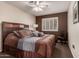 Comfortable guest bedroom with a queen-size bed at 1350 W Seascape Dr, Gilbert, AZ 85233