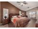 Spacious Primary bedroom with a king-size bed, and plenty of natural light at 1350 W Seascape Dr, Gilbert, AZ 85233