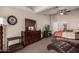 Bright bedroom with dresser, mirror, and large window at 1350 W Seascape Dr, Gilbert, AZ 85233