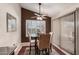 Cozy dining area with a glass table and four chairs at 1350 W Seascape Dr, Gilbert, AZ 85233