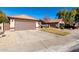 House exterior with driveway and neighborhood view at 1350 W Seascape Dr, Gilbert, AZ 85233