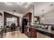 Modern kitchen with dark wood cabinets and stainless steel appliances at 1350 W Seascape Dr, Gilbert, AZ 85233