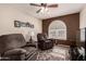 Relaxing sitting room with two armchairs and a large window at 1350 W Seascape Dr, Gilbert, AZ 85233