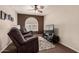Home office or sitting room with two comfortable armchairs and TV at 1350 W Seascape Dr, Gilbert, AZ 85233