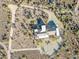 Aerial view of single-story house with desert landscaping and mountain views at 148 N La Barge Rd, Apache Junction, AZ 85119