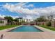 Backyard with a refreshing pool and patio at 14918 W Escondido Dr, Litchfield Park, AZ 85340