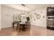 Cozy breakfast nook with round table and built-in seating at 14918 W Escondido Dr, Litchfield Park, AZ 85340