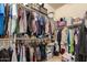Large walk-in closet with ample shelving and hanging space at 14918 W Escondido Dr, Litchfield Park, AZ 85340