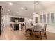 Eat-in kitchen with an island and breakfast nook at 14918 W Escondido Dr, Litchfield Park, AZ 85340