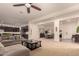 Open floor plan with living room, kitchen, and dining area at 14918 W Escondido Dr, Litchfield Park, AZ 85340