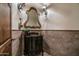 Vanity in corner bathroom with decorative mirror at 15402 E Crested Butte Trl, Fountain Hills, AZ 85268