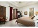 Bedroom with a large bed and access to a balcony at 15402 E Crested Butte Trl, Fountain Hills, AZ 85268