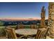 Elegant patio furniture with sunset views at 15402 E Crested Butte Trl, Fountain Hills, AZ 85268