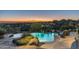Luxury pool and spa with city views and relaxing seating at 15402 E Crested Butte Trl, Fountain Hills, AZ 85268