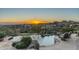 Stunning infinity pool with breathtaking sunset views at 15402 E Crested Butte Trl, Fountain Hills, AZ 85268