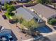 Aerial view of single-story house with desert landscaping and two-car garage at 1643 E Bishop Dr, Casa Grande, AZ 85122