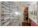 Bathroom with shower/tub combo, double vanity, and walk-in closet at 1643 E Bishop Dr, Casa Grande, AZ 85122