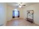 Spacious bedroom with ceiling fan and tile floor at 1643 E Bishop Dr, Casa Grande, AZ 85122