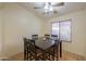 Bright dining area with tile flooring and a square table at 1643 E Bishop Dr, Casa Grande, AZ 85122