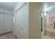 Hallway with linen closet and bathroom access at 1643 E Bishop Dr, Casa Grande, AZ 85122