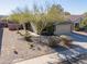 Single-story house with two-car garage and desert landscaping at 1643 E Bishop Dr, Casa Grande, AZ 85122