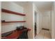 Home office features built-in shelving and workspace at 1643 E Bishop Dr, Casa Grande, AZ 85122
