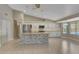 Island kitchen with granite countertops and stainless steel appliances at 1656 E Montoya Ln, Phoenix, AZ 85024