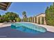 Backyard pool featuring a spa, surrounded by well-maintained landscaping, and plenty of space for outdoor lounging at 1656 E Montoya Ln, Phoenix, AZ 85024