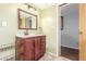 Bathroom with vanity, mirror and shower at 17200 W Bell Rd # 439, Surprise, AZ 85374