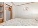 Bedroom with a double bed and access to kitchen at 17200 W Bell Rd # 439, Surprise, AZ 85374
