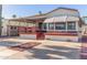 Single-wide mobile home with covered patio and carport at 17200 W Bell Rd # 439, Surprise, AZ 85374