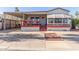 Single-wide mobile home with covered patio and carport at 17200 W Bell Rd # 439, Surprise, AZ 85374