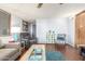 Living room with L-shaped sofa and wood-look floors at 17200 W Bell Rd # 439, Surprise, AZ 85374