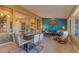 Elegant dining area with glass table and modern chairs at 18031 N Timber Ridge Dr, Surprise, AZ 85374