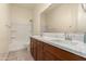 Clean bathroom with double vanity and a bathtub at 18346 W Coolidge St, Goodyear, AZ 85395