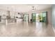 Modern kitchen with white cabinets, an island, and stainless steel appliances at 18346 W Coolidge St, Goodyear, AZ 85395